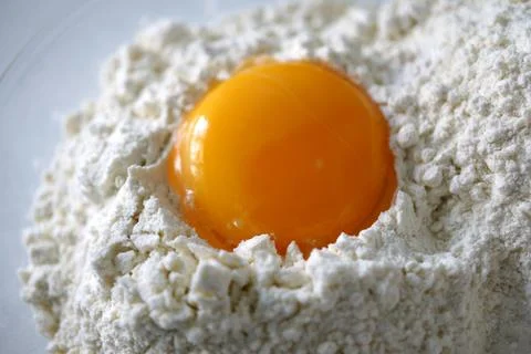 Egg flour on white background close up - baking ingredients egg yolk for br.. Foto stock