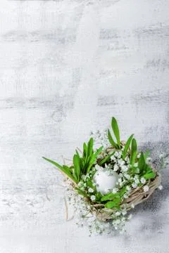 Egg with flowers on a white background. Easter Symbols. Stock Photos