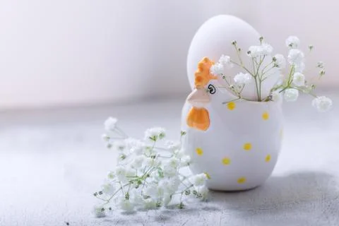 Egg with flowers on a white background. Easter Symbols. Stock Photos
