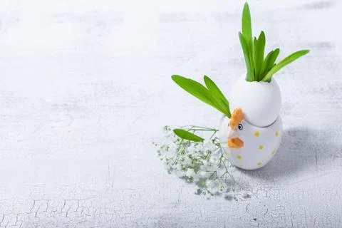 Egg with flowers on a white background. Easter Symbols. Stock Photos