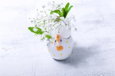 Egg with flowers on a white background. Easter Symbols. Stock Photos
