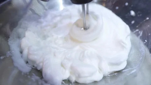 Egg foam mixing  with machine Stock Footage 127094542