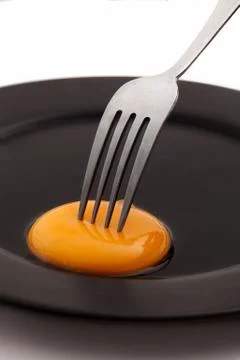 Egg with fork Stock Photos