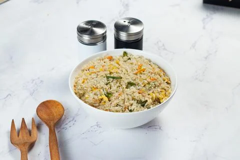 Egg Fried Rice served in a dish isolated on background side view of chinese f Stock Photos