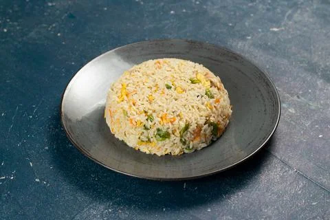 Egg Fried Rice served in a dish isolated on background side view of chinese f Stock Photos
