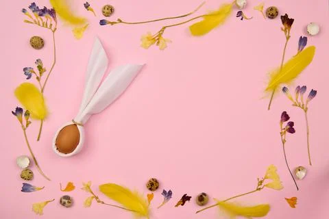 Egg hare on a light background for text with Easter decor Stock Photos