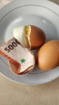 An egg that hatches rupiah money Stock Photos