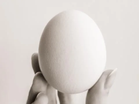 The egg in his hand Fotos Stock