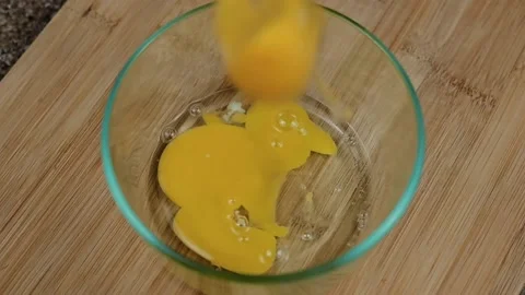 Egg Hitting Bowl Slow Motion Stock Footage 138335813