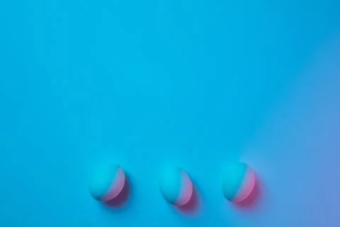 Egg hunt is coming. Easter traditions, neon colored eggs, top view Stock Photos