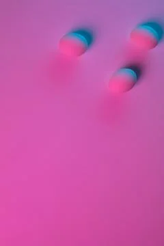 Egg hunt is coming. Easter traditions, neon colored eggs, top view Stock Photos