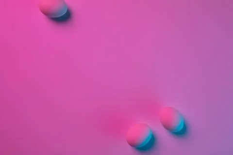 Egg hunt is coming. Easter traditions, neon colored eggs, top view Stock Photos