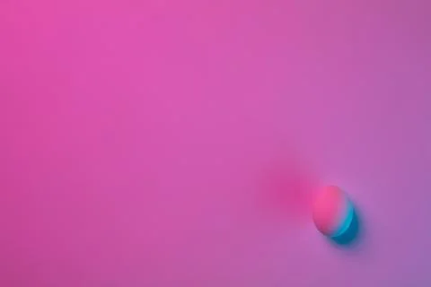 Egg hunt is coming. Easter traditions, neon colored eggs, top view Stock Photos