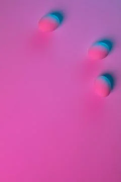 Egg hunt is coming. Easter traditions, neon colored eggs, top view Stock Photos
