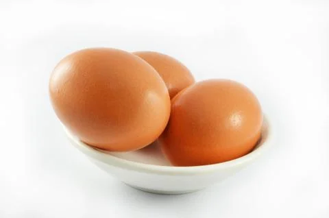 Egg isolated / Three eggs in white bowl isolated on white background Stock Photos