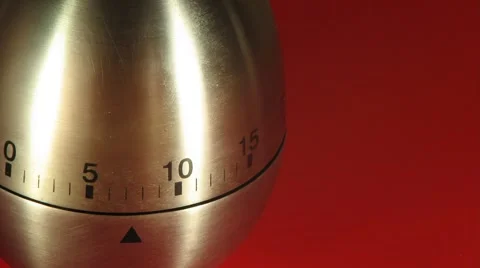 Egg Kitchen Timer on a Red Table Stock Footage 915319