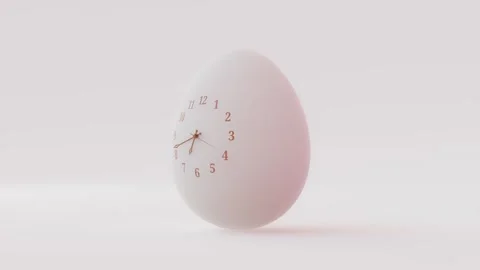 Egg that looks like an clock animation on white background.  Video stock 265123844