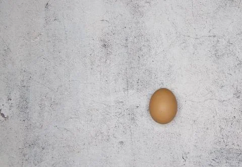 Egg on marble table . top view . minimalistic food Stock Photos