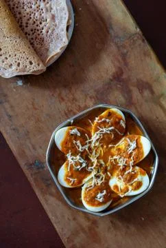 Egg masala in a plate on the table Stock Photos