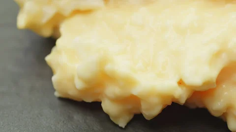 Egg mayonnaise macro close up presentation slowly rotating stock footage Stock Footage 344794972