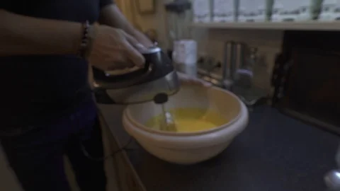 Egg mixing with machine Stock Footage 127093936