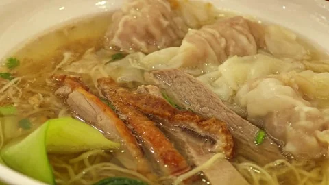 Egg noodle Soup, with dumpling and duck. Stock Footage 305232911