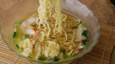 Egg noodles with wonton. Stock Footage 310599763
