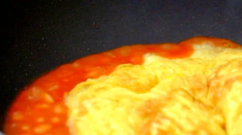 Egg omelet &amp; baked beans cooking 2 Stock Footage 41477347