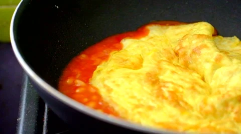 Egg omelet &amp; baked beans cooking 1 Stock Footage 41496638