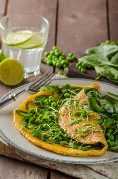 Egg omelette with herbs Stock Photos