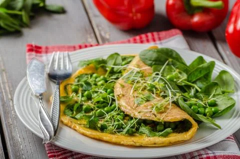 Egg omelette with herbs Stock Photos