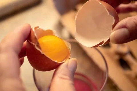 An egg is opened and separated Foto stock