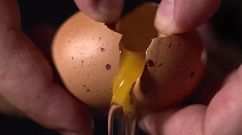 Egg opening in super slow motion Stock Footage 68963482