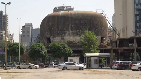 The Egg or the Dome, an unfinished and abounded building in Beirut Stock Footage 253230561