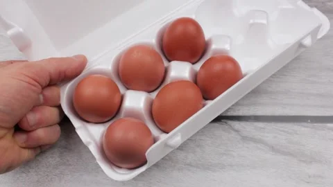 Egg packaging. Food chicken eggs in the package. Stock Footage 184471029