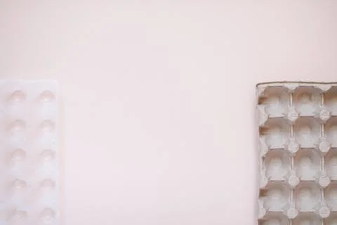 Egg packaging: recyclable and plastic. Waste sorting. Ecological problems Stock Photos