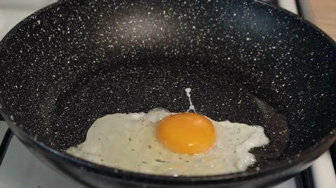 Egg in the pan Stock Footage 48690830