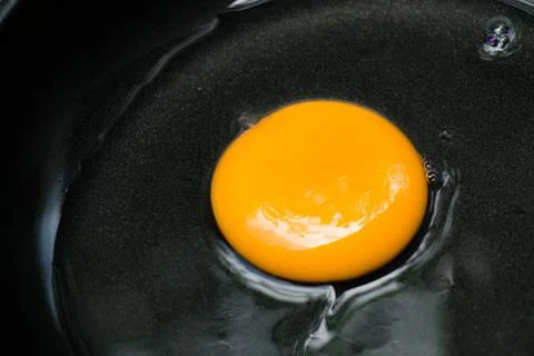 Egg in pan on white background Foto stock