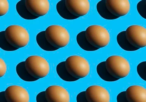 Egg pattern on blue background. repetitive, duplicate items. Easter 스톡 사진