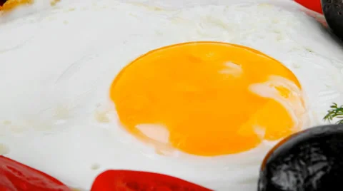 Egg on red dish with vegetables 스톡 동영상 38760269