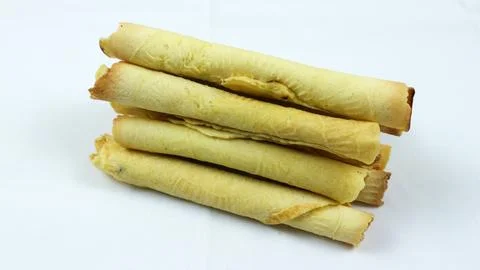 Egg roll biscuit isolated on white background. Biscuits served during Ramad.. Stock Photos