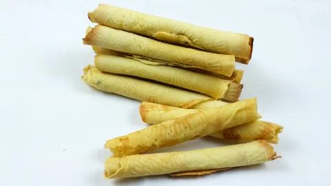 Egg roll biscuit isolated on white background. Biscuits served during Ramad.. Stock Photos