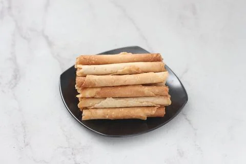 Egg roll or Semprong is snacks that normally serve on Hari Raya or Eid Al Fit Stock-Fotos