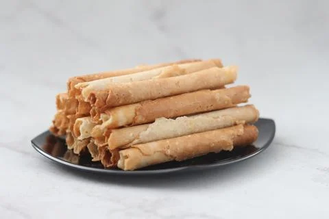 Egg roll or Semprong is snacks that normally serve on Hari Raya or Eid Al Fit Stock Photos