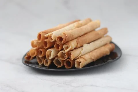 Egg roll or Semprong is snacks that normally serve on Hari Raya or Eid Al Fit 写真素材