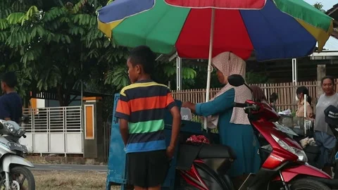 Egg roll seller Stock Footage 208929879