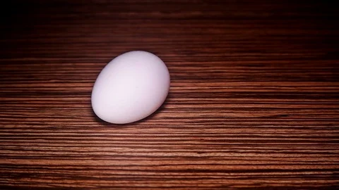 The egg rotates in slow motion Stock Footage 74435444