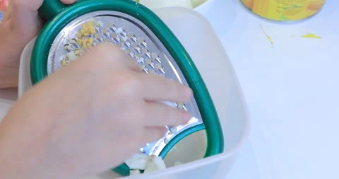 Egg rubbed on a grater Video stock 145955893