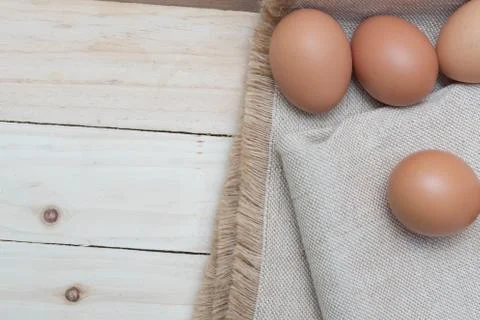 Egg on sack background Stock Photos