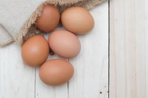 Egg on sack background Stock Photos